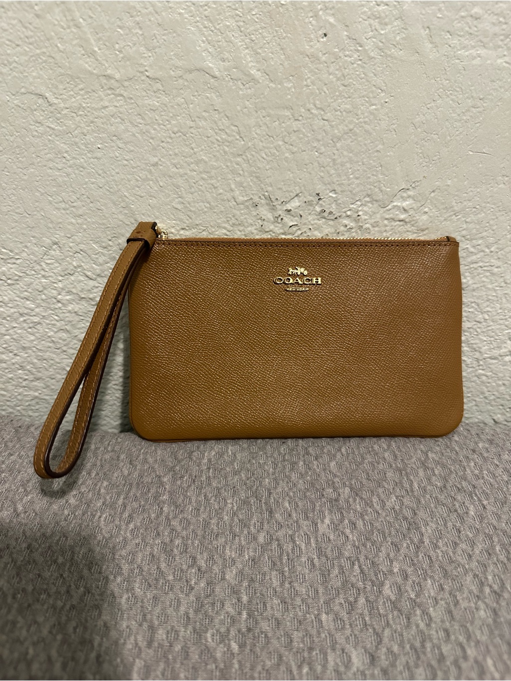 Like New Coach Leather Tan Wristlet Pouch With Gold Logo
